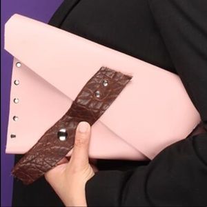 Handcrafted Pink & Brown Leather textured strap and silver snap closure.